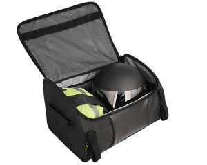 Photo of Traveler Lite open with helmet and rainwear inside